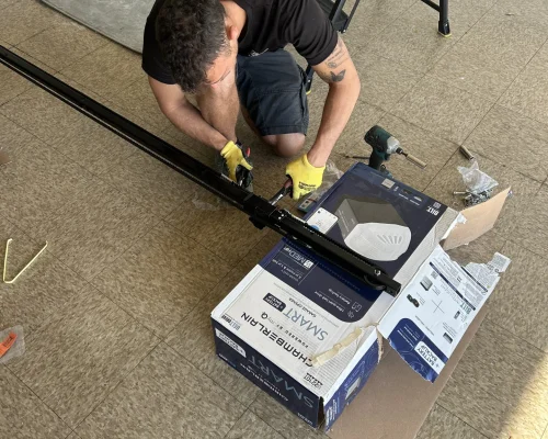 Garage Door Repair Huntington Beach 24 a carlos garage door technician working on a garage door opener
